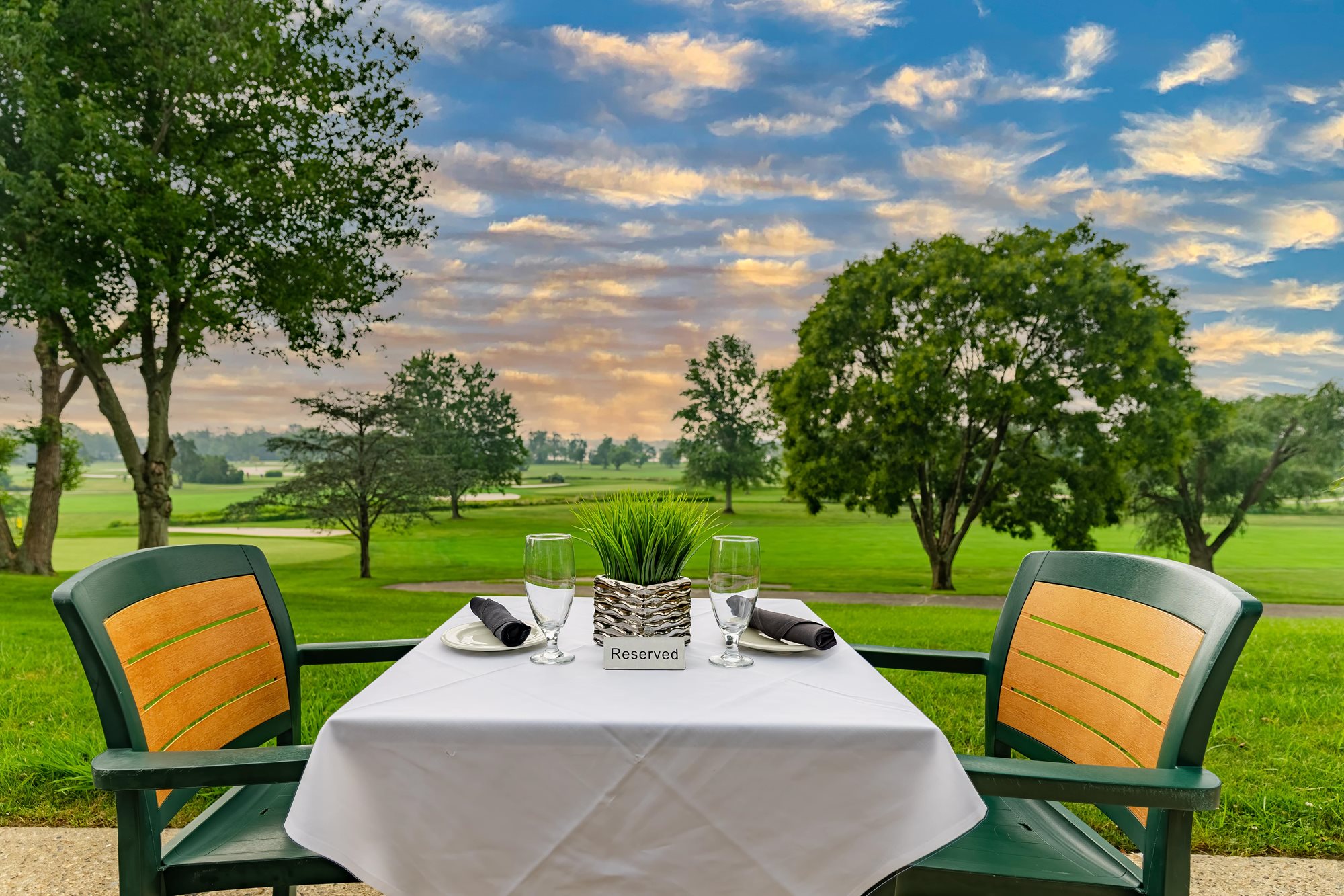 aerial_outside_dining_table_reserve_sign-min